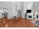 Spacious living room with a fireplace, wood floors, and seamless layout, perfect for entertaining at 415 N Church St # 311, Charlotte, NC 28202