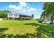 Large lawn, lake, and a gazebo in the backyard at 441 Wildlife Club Ln, Taylorsville, NC 28681