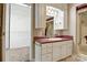 Bathroom featuring vanity, sink, mirror, storage and walk-in closet at 441 Wildlife Club Ln, Taylorsville, NC 28681
