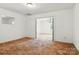 A bonus room could function as a bedroom with mirror and adjacent room at 441 Wildlife Club Ln, Taylorsville, NC 28681