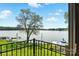 Beautiful lake view from the deck features docks, a gazebo and mature trees at 441 Wildlife Club Ln, Taylorsville, NC 28681