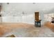 Spacious living room featuring recessed lighting, ceiling fans, neutral carpet, and a classic fireplace as the focal point at 441 Wildlife Club Ln, Taylorsville, NC 28681