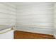 The pantry is equipped with wire shelving and wood floors at 441 Wildlife Club Ln, Taylorsville, NC 28681