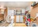 Traditional kitchen with white cabinets and appliances, offering a functional space at 5239 Lineberger Rd, Stanley, NC 28164
