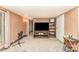 A cozy living room with carpeted floors, featuring a large TV at 5239 Lineberger Rd, Stanley, NC 28164
