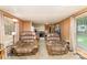 Cozy living room with comfortable seating, and a view of the kitchen at 5239 Lineberger Rd, Stanley, NC 28164