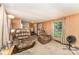 Inviting living room featuring cozy seating and a glimpse into the kitchen at 5239 Lineberger Rd, Stanley, NC 28164