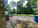 Open backyard space with trees, offering a peaceful outdoor setting at 5570 George Henry Dr, Hickory, NC 28602