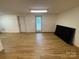 Large, open basement featuring modern vinyl flooring and ample natural light at 5570 George Henry Dr, Hickory, NC 28602