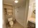 Bathroom featuring tile flooring, shower, toilet and vanity at 5570 George Henry Dr, Hickory, NC 28602
