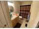Bathroom with modern vanity, toilet, shower, and colorful towels at 5570 George Henry Dr, Hickory, NC 28602