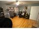Bedroom with hardwood floors, desk, mounted deer head, and lots of natural light at 5570 George Henry Dr, Hickory, NC 28602