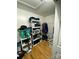 Walk in closet with clothing, storage shelves, and cleaning equipment at 5570 George Henry Dr, Hickory, NC 28602