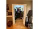Open view of walk in closet with gun safe, clothing, and storage shelves at 5570 George Henry Dr, Hickory, NC 28602