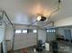 Two-car garage interior with door openers, storage, and work area at 5570 George Henry Dr, Hickory, NC 28602
