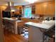 Bright kitchen with ample cabinet space, stainless steel appliances, and breakfast bar at 5570 George Henry Dr, Hickory, NC 28602
