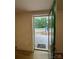 View of backyard with concrete patio from inside of the back door at 5570 George Henry Dr, Hickory, NC 28602