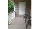 Cozy porch with neutral tones, providing a relaxing outdoor seating area at 5570 George Henry Dr, Hickory, NC 28602