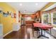 Eat in kitchen featuring wood cabinets, stainless steel appliances and a bay window to let the light in at 5711 Lambrook Ct, Charlotte, NC 28269