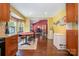 Eat in kitchen featuring the view into the living room to create an open concept living space at 5711 Lambrook Ct, Charlotte, NC 28269