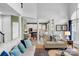 Open-concept living room with soaring ceilings, modern furnishings, and elegant decor at 7800 Conifer Cir, Indian Trail, NC 28079