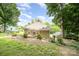 Cozy single-story home with a neat yard and mature trees offering a peaceful setting at 816 Fulton St, Albemarle, NC 28001