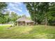 Charming single-story home featuring a cozy design and a well-maintained lawn with mature trees at 816 Fulton St, Albemarle, NC 28001