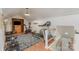 Finished attic space converted into a home gym, features a variety of equipment at 827 Ashwyn Dr, Charlotte, NC 28211