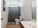 This bathroom features a large single sink vanity and tub shower at 8915 Merrie Rose Ave, Charlotte, NC 28213