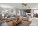 Spacious living room boasts hardwood floors, neutral paint and comfortable seating at 8915 Merrie Rose Ave, Charlotte, NC 28213