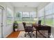 Bright home office with large windows and a view of the lawn at 8915 Merrie Rose Ave, Charlotte, NC 28213