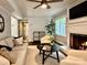 Inviting living room features fireplace, neutral tones, and hardwood flooring at 9305 Harps Mill Ct, Charlotte, NC 28270