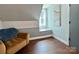 Cozy nook with hardwood floors, natural light, and a comfortable seating area at 9305 Harps Mill Ct, Charlotte, NC 28270
