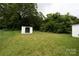 Large backyard with shed and mature trees at 1017 W Fisher St, Salisbury, NC 28144