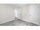 Clean bedroom with new gray flooring and fresh paint at 1017 W Fisher St, Salisbury, NC 28144