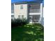 Enjoy this backyard with its green lawn and outdoor patio overlooking the yard at 10416 Audubon Ridge Dr # 4, Cornelius, NC 28031