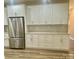 Kitchen with stainless steel appliances and white cabinets at 10416 Audubon Ridge Dr # 4, Cornelius, NC 28031