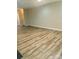 Large living room with hardwood floors at 10416 Audubon Ridge Dr # 4, Cornelius, NC 28031