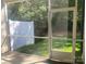 Screened patio with view of fenced yard at 10416 Audubon Ridge Dr # 4, Cornelius, NC 28031