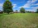 Expansive backyard perfect for recreation, relaxation, and entertaining friends and Gathering at 1050 Old Peachland Rd, Marshville, NC 28103