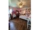 Unique decorated bedroom, complete with hardwood floors, ceiling fan, and ample storage at 1050 Old Peachland Rd, Marshville, NC 28103