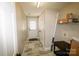 Functional hallway with neutral tones, storage, and easy access to laundry room at 11123 Waxberry Dr, Charlotte, NC 29277