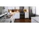 Modern kitchen featuring stainless steel appliances, granite countertops, and dark backsplash at 11123 Waxberry Dr, Charlotte, NC 29277