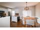 Open-concept kitchen and breakfast nook featuring updated appliances and finishes at 11123 Waxberry Dr, Charlotte, NC 29277