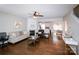 Open-concept living area boasts hardwood floors, a fireplace, and seamless flow to the kitchen at 11123 Waxberry Dr, Charlotte, NC 29277