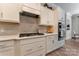 Well-appointed kitchen with stainless steel appliances, custom cabinets, and quartz countertops at 11313 Limehurst Pl, Charlotte, NC 28278