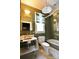 Cozy bathroom featuring a glass shower, classic tiled flooring, and vintage fixtures at 1137 Queens W Rd, Charlotte, NC 28207