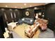 Cozy living room features a comfortable blue sofa, stylish seating, and a modern glass coffee table at 1137 Queens W Rd, Charlotte, NC 28207