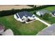 Overhead view of a home on a large grassy lot with a circular driveway at 115 Augusta Ln, Shelby, NC 28150