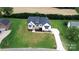 An aerial view of a home featuring a spacious driveway and large front yard at 115 Augusta Ln, Shelby, NC 28150